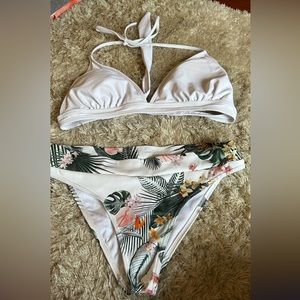 Bottoms are Ripcurl, top is from Amazon but matches well!